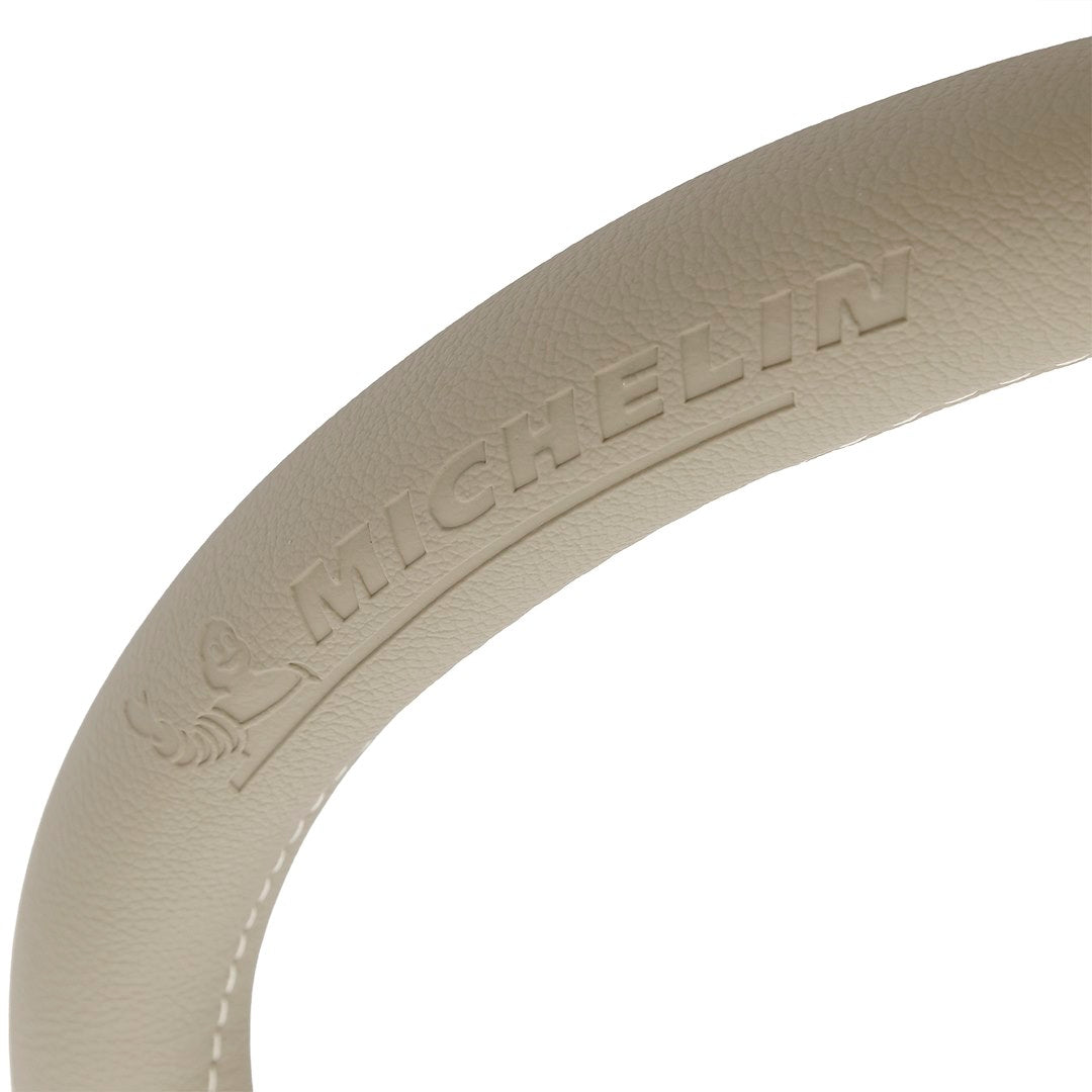 Beige M-rattisuojus auton ohjauspyörään